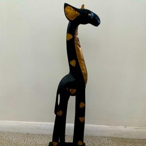 Wooden giraffe statue